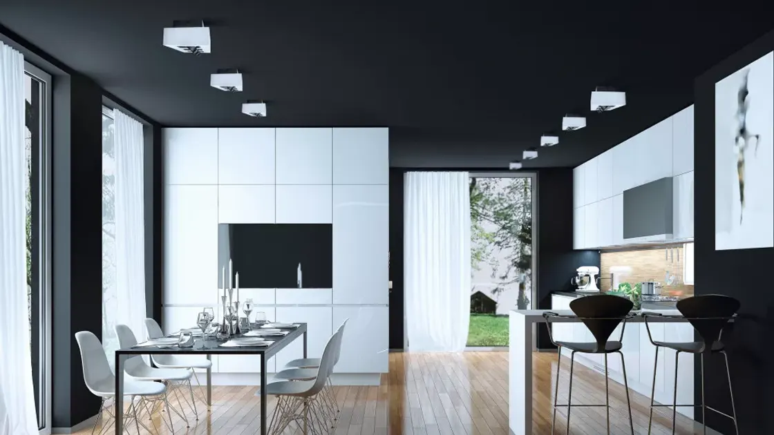 Fekete felületre szerelt spot modern enteriőrben